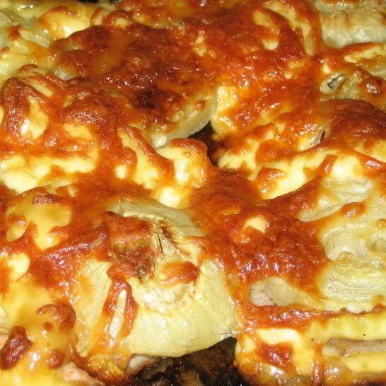 Рецепт свинины по-французски с сыром и луком